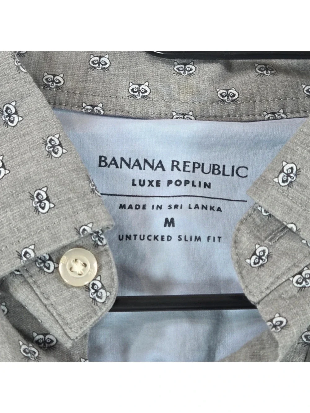 Banana Republic all-over grey raccoon face print.